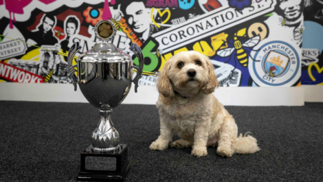 An ecstatic Gus with his trophy