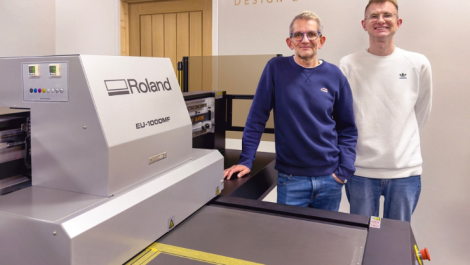 Baz Smith (L) with son Asa alongside the Roland machine